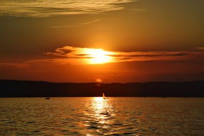 Scenic view of sea at sunset