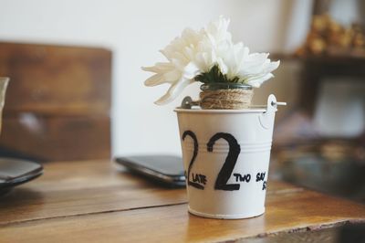 Close-up of flowers in vase on table