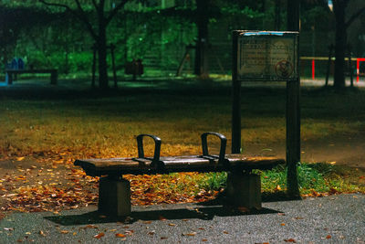 Empty bench in park