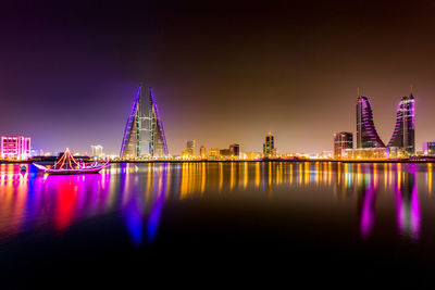 Illuminated manama waterfront at night