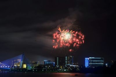 Firework display at night