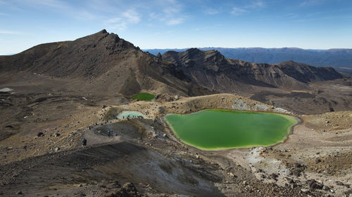 Scenic view of volcanic landscape against sky