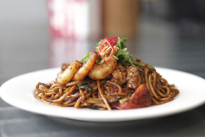 Close-up of mie goreng in plate on table