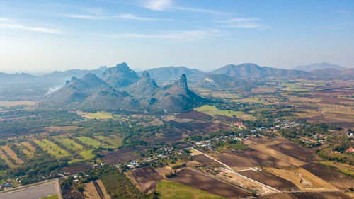 Aerial view of landscape and mountains against sky