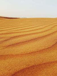 Scenic view of desert against clear sky