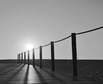 Scenic view of sea against clear sky during sunset