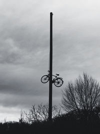 Low angle view of street light against sky