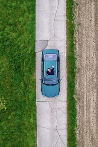 Top view of mercedes car in farmland 