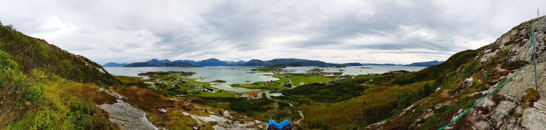 Panoramic view of landscape and mountains against sky