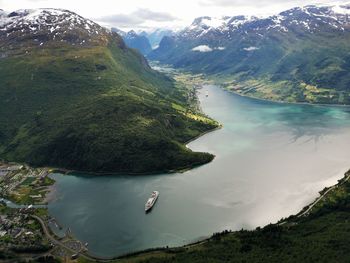 High angle view of lake amidst mountains