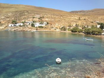 Scenic view of town against clear sky