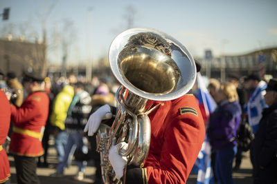 Trumpeter of military band. wind instrument. music performance. military parade.