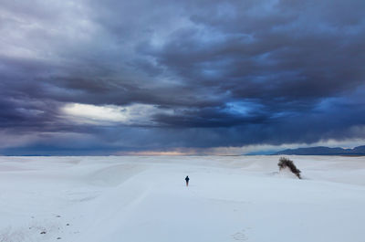 Scenic view of snow covered landscape against sky