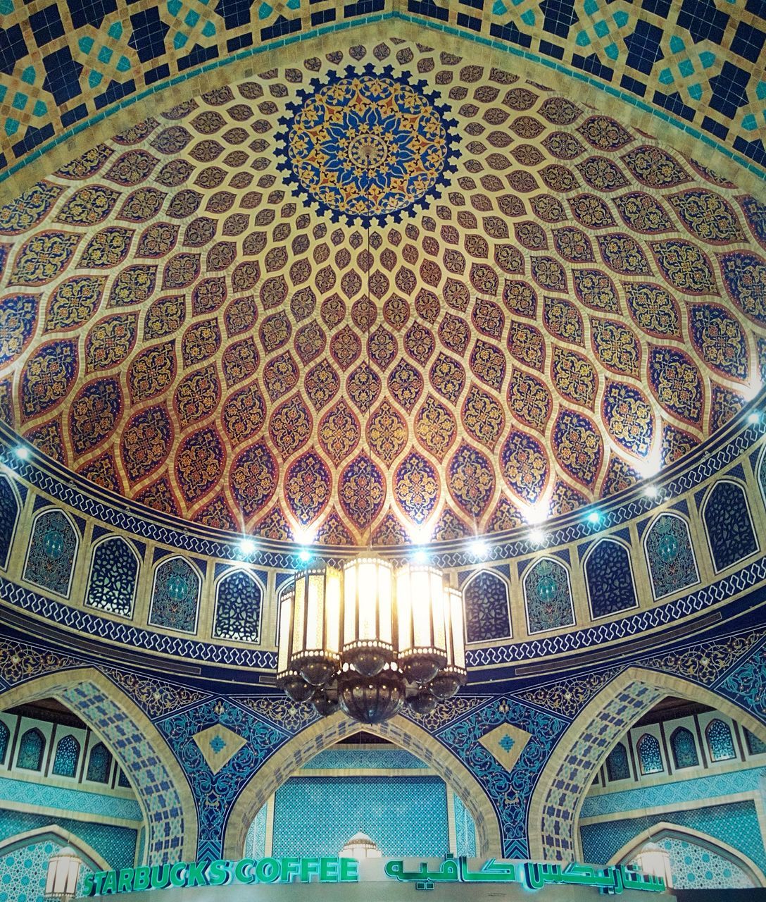 LOW ANGLE VIEW OF ORNATE CEILING