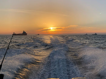 Scenic view of sea against sky during sunset