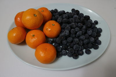 Close-up of fruits in plate