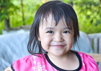 Portrait of cute girl smiling