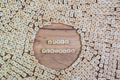 High angle view of wooden letter toy blocks on table