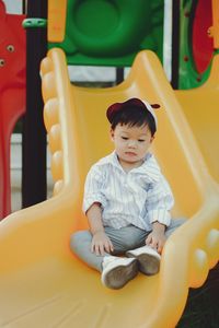 Cute boy playing in playground