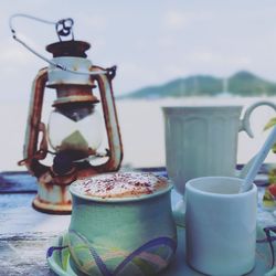 Close-up of coffee cup on table