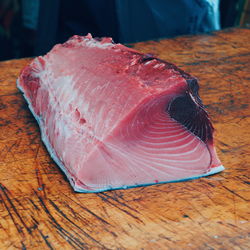 Close-up of fish on wood at market