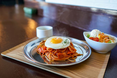 Close-up of breakfast served on table