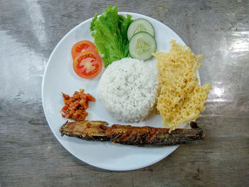 High angle view of food served on table