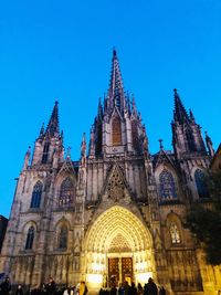 Low angle view of building against blue sky