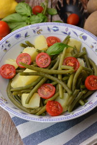 High angle view of fruits in plate on table