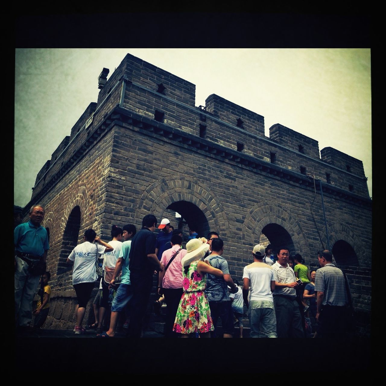 HIGH ANGLE VIEW OF PEOPLE LOOKING AT CITY