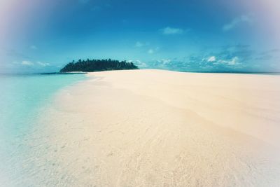 Scenic view of beach against sky