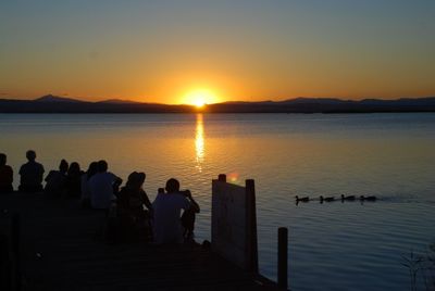 Scenic view of sea against clear sky during sunset