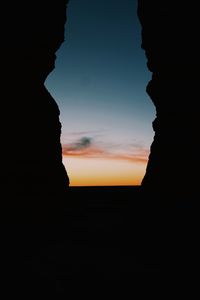 Scenic view of landscape against sky at sunset