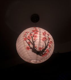 Low angle view of illuminated lantern