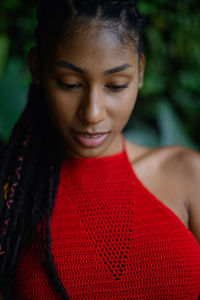 Close-up portrait of a smiling young woman