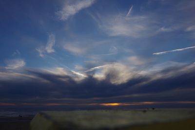 Low angle view of dramatic sky over sea