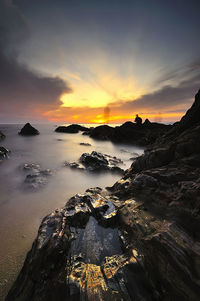 Scenic view of sea against sky during sunset