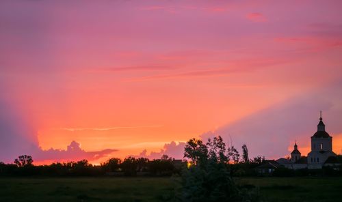 Scenic view of landscape at sunset