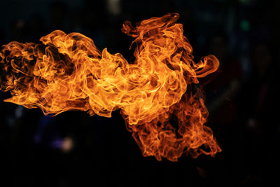 Close-up of fire against black background