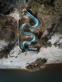 High angle view of plant on land against wall