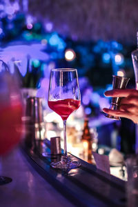 Close-up of wine in glass on table at restaurant