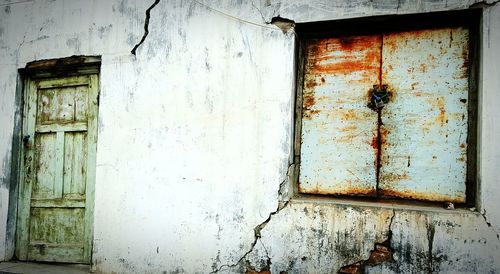 Closed door of abandoned house