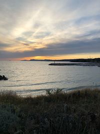 Scenic view of sea against sky during sunset