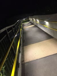 High angle view of illuminated staircase at night