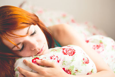 Woman lying down on bed