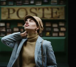 Young woman standing in city