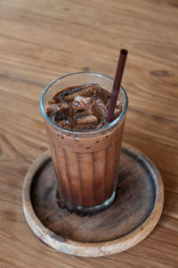 Glass of coffee on table