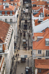 High angle view of street amidst buildings in town