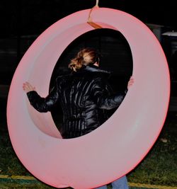 Rear view of woman in playground