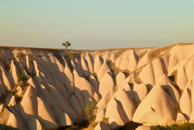 Scenic view of desert against clear sky